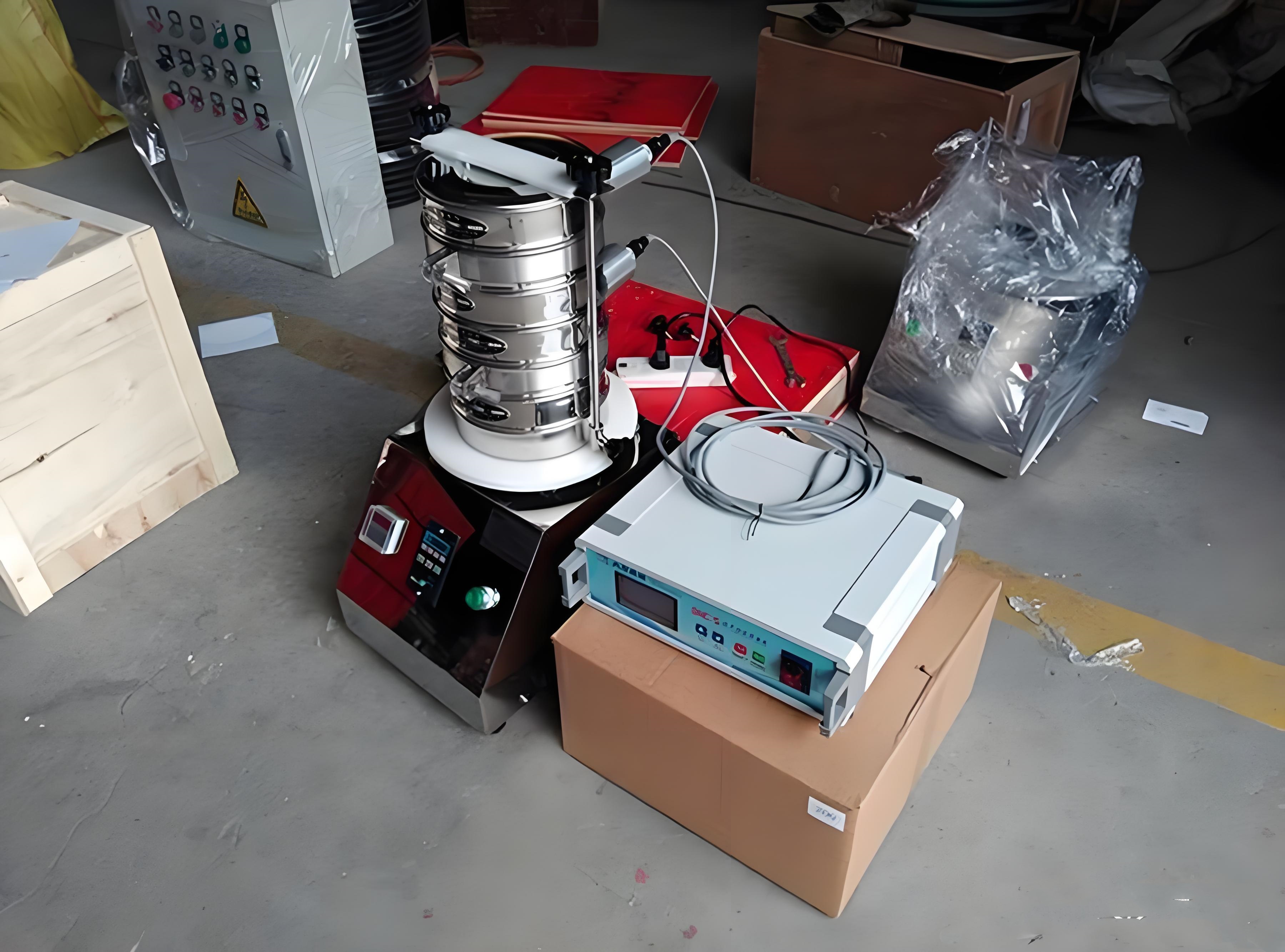 Ultrasonic vibration applied to test sieve mesh for fine powder screening
